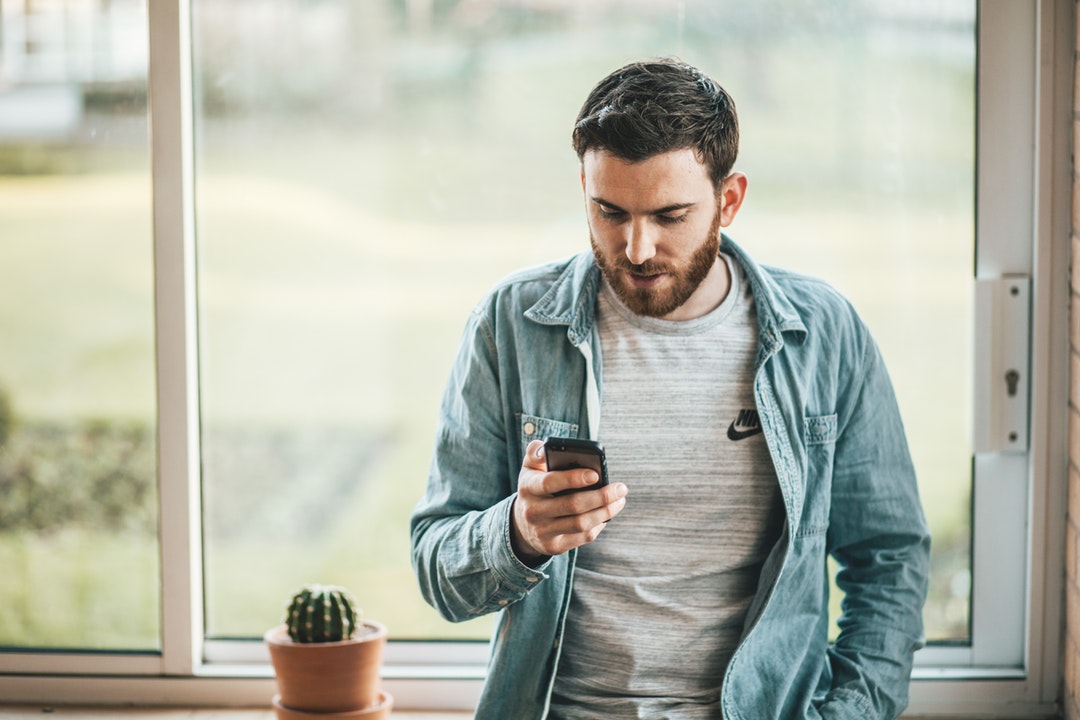 man holding a smartphone